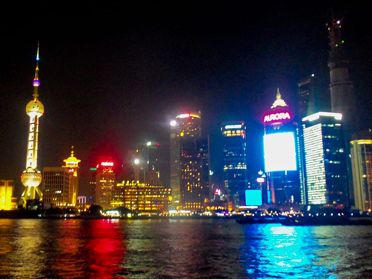 Shanghai Tower and Lujiazui skyline viewed from the Huangpu River area.
