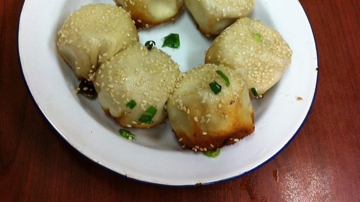 A plate of pan-fried shengjianbao dumplings in Shanghai.