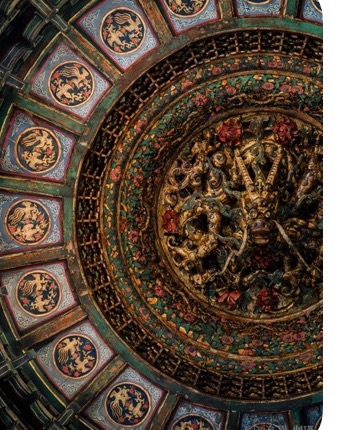 Decorated imperial ceiling detail inside the Forbidden City.